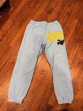 Freecity Pale Blue Sweatpants with Bright Yellow Logo